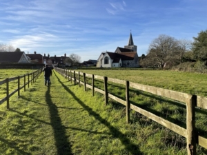 Summer view of the Binsted Church in the distance