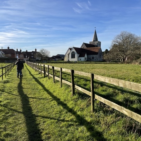 Summer view of the Binsted Church in the distance